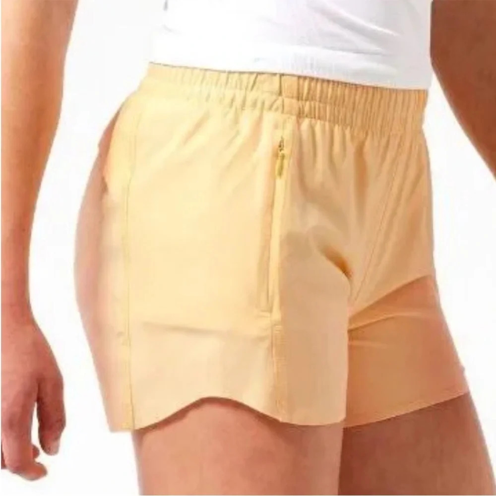 Athleta Girl Heart the Hustle 2.5 Shorts Size L/ 12 Yellow